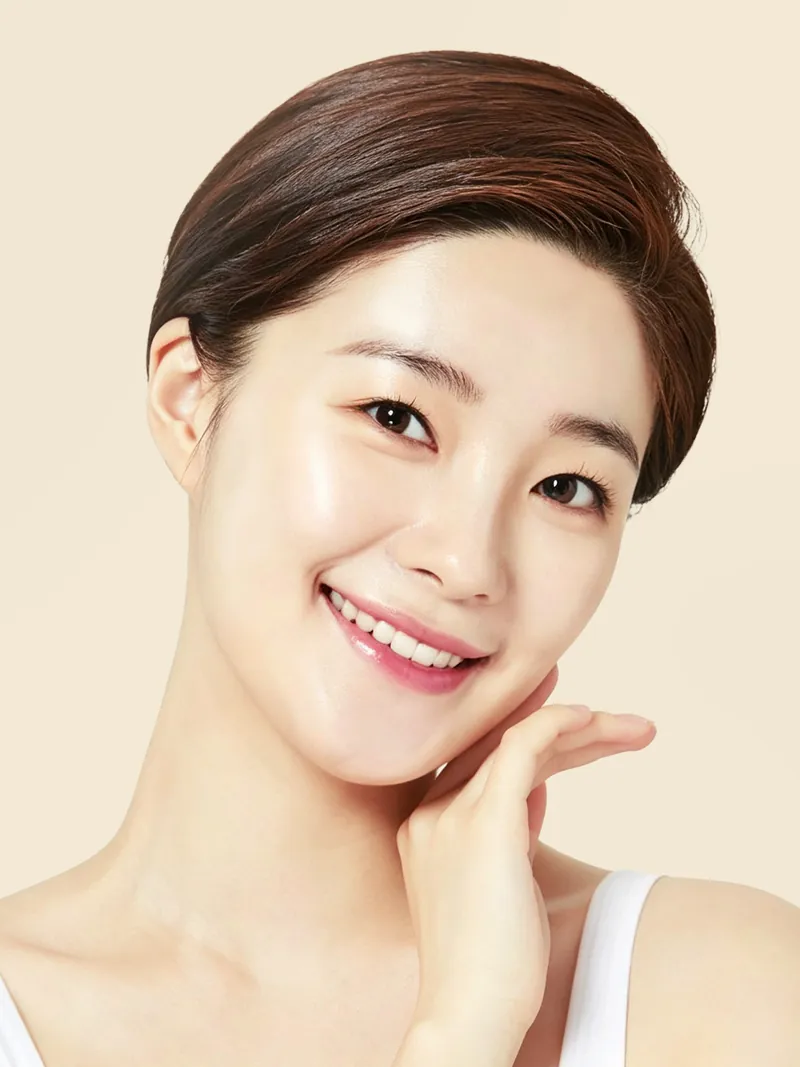 A client with glowing skin in soft light