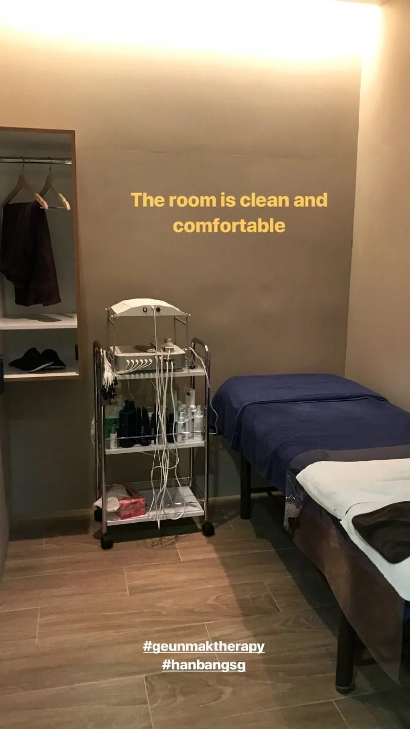 Instagram story: a treatment room with a navy-draped bed, captioned 'The room is clean and comfortable'