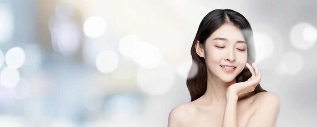 A client with glowing skin in soft light